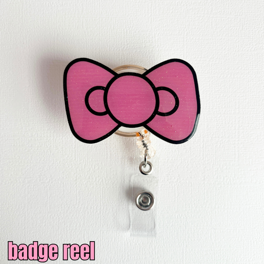 kitty bow badge reel